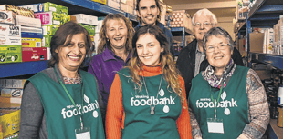 Woking Foodbank turns ten years old – but volunteers are conflicted