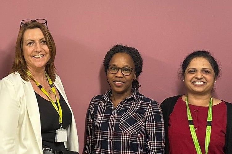 Joy, middle, with hospital manager Carla Roadnight and Kirti Paik-Inkar