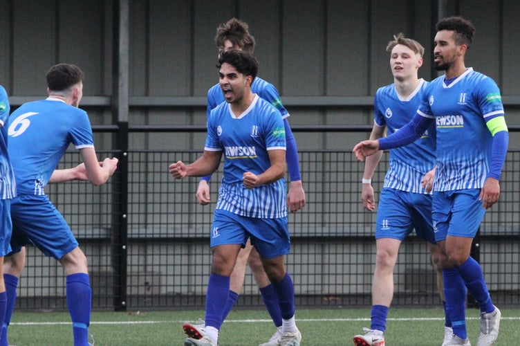 Harvey Dosanjh is congratulated after scoring Sheerwater's third goal v Tooting & Mitcham United, March 9th 2024.