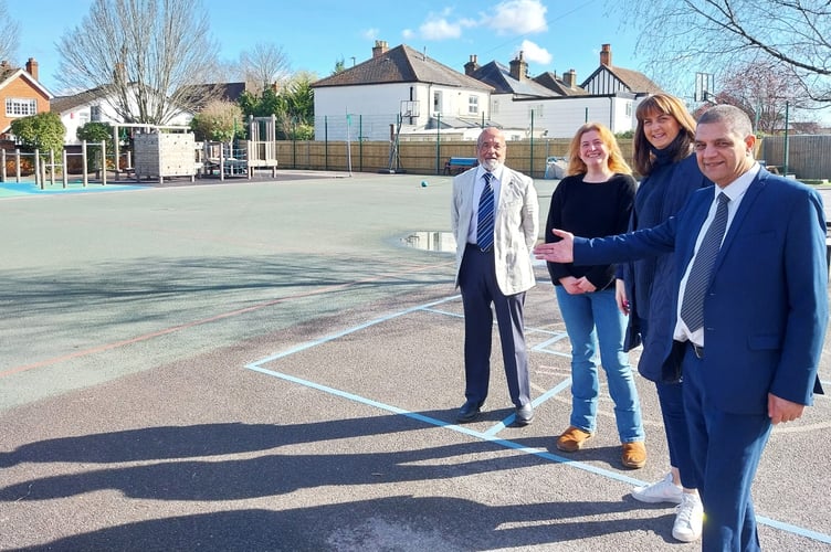 From left, Cllr Hassan Akberali,  Vikki Zeila, Knaphill Schools PTA vice-chair, and Debbie Harrison, headmistress, Cllr Saj Hussain