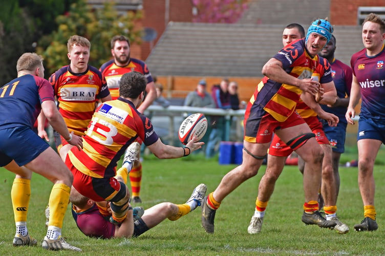 Chobham's Cameron Barr passing to Sam Goddard (Photo: John O'Brien)