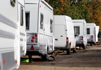Dozens of Traveller caravans in Woking