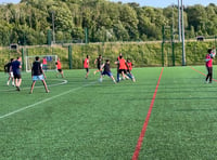 Fire Service and Woking charity play football 