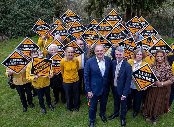 Will Forster, with Lib Dem leader Ed Davey, Woking Borough Council leader Ann Marie Barker and councillors and activists