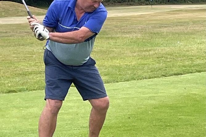 Event organiser Andy Beckett tees off