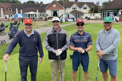 Generous golfers tee up £6k for charity