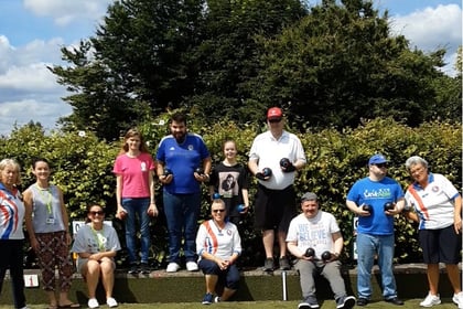 Bowling Club welcomes charity to the green