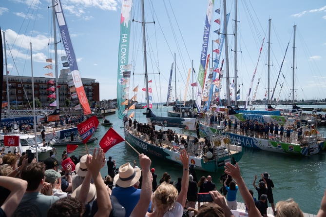 Crowds line the Gunwharf Quay dockside as Ha Long Bay, Viet Nam arrives in Portsmouth (imagecomms)