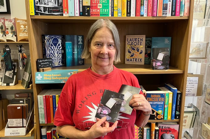 Liz with her book at the Lionsheart Bookshop & Café in Woking 