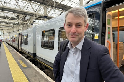 Woking MP calls for freeze on rail fares 