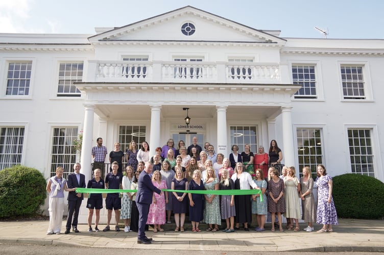 Robert Crowther cuts the ribbon at the re-opening of Heywood House