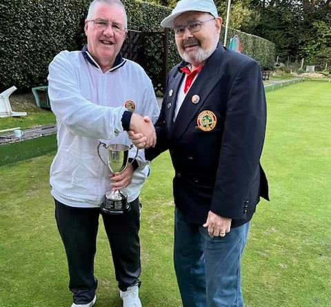 Men's Championship winner Andrew Boarer (left) with Mayford Hall Bowls Club president Bob Hills