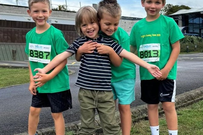 Leukaemia survivor George Peers, brother Henry, and friends Kasper and Alex