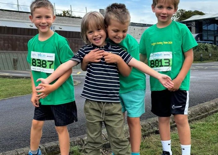 Leukaemia survivor George Peers, brother Henry, and friends Kasper and Alex