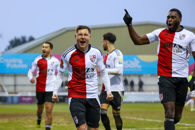 Harry Beautyman celebrates after giving Woking the lead against Ebbsfleet United (Photo: Phil Fiddes)