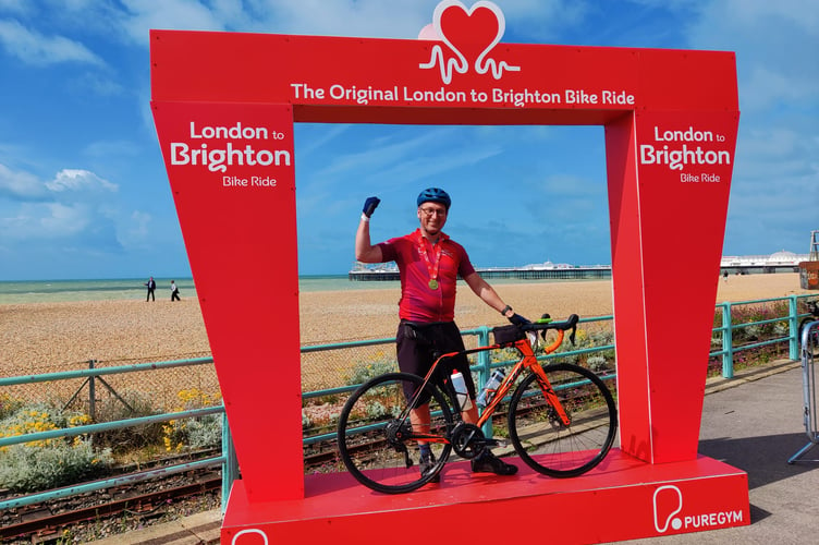 Pennypot parent Ian Richardson, who cycled 54 miles from London to Brighton - Pennypot Day Nursery in Chobham