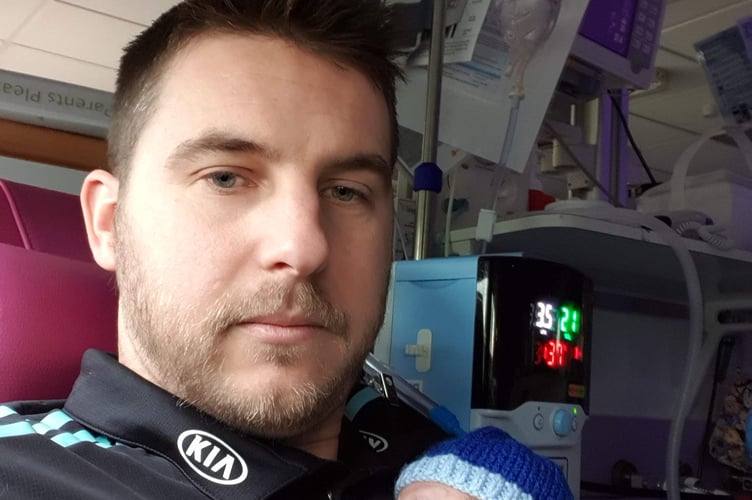 Nick and his son Austin in the neonatal intensive care unit at St Peter’s Hospital